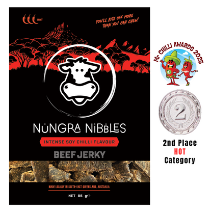 Nungra Nibbles Beef Jerky packaging with branding and awards on a black background