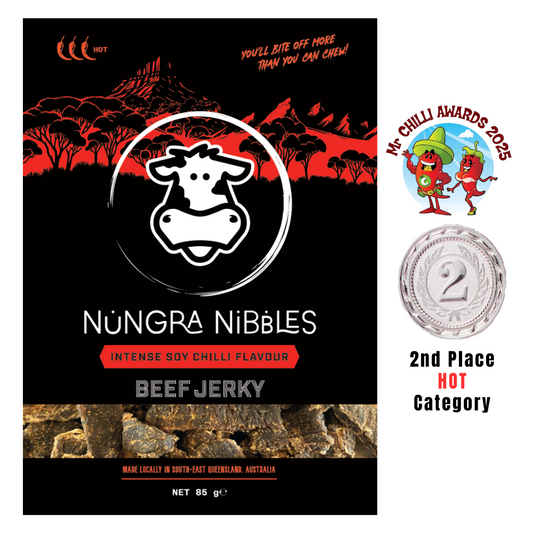 Nungra Nibbles Beef Jerky packaging with branding and awards on a black background